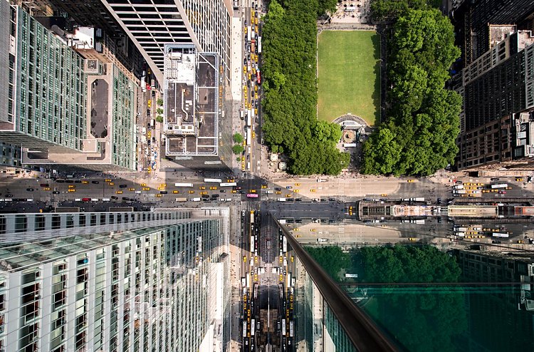 Looking straight down on 6th Ave and 42nd St from a 600ft skyscraper