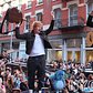 Ed Sheeran gives surprise performance from atop parked car on SoHo streetin new york city