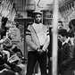 1980's: A member of the volunteer crime-fighting organization, the Guardian Angels, patrols a subway car in the 1980s. The organization was both praised and vilified by the media for its efforts. 