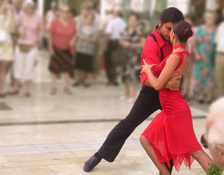 Tango Dancers | Two Tango dancers in action on the street during the Feria of August in Malaga (SPA).
Formerly erroneously known as Flamenco Dancers.