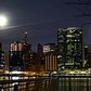 Time-lapse of The Setting Full Moon over Midtown Manhattan - A Hyperlapse of the Setting Moon next to the Empire State Building