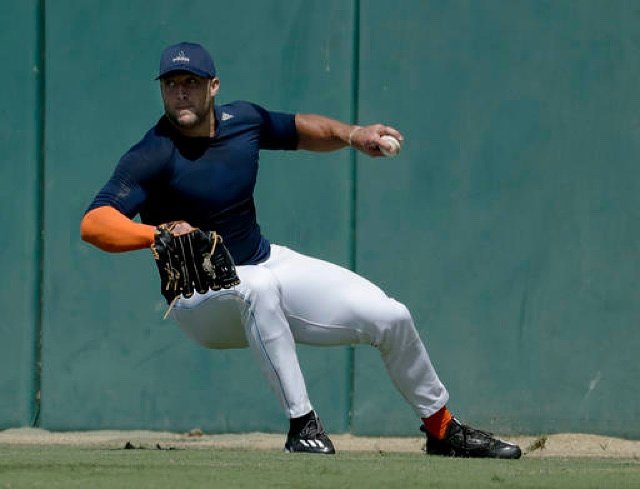 Tim Tebow, showing off his uh...athletic grace, during a showcase at USC last month.