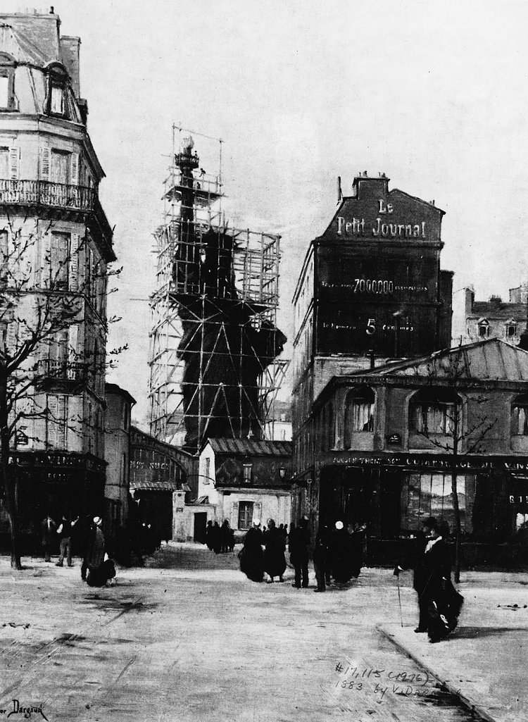 The Statue of Liberty enclosed by scaffolding, while under construction, seen from the Rue de Chazelles, in Paris circa 1884.