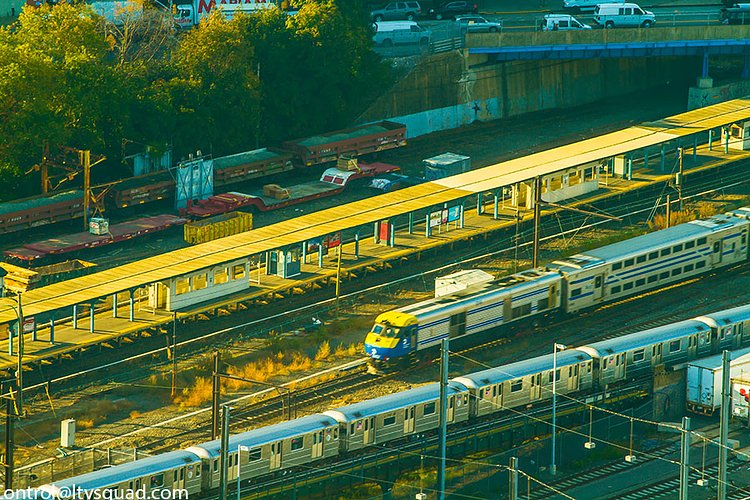 LIRR & The 7 Train passing Hunterspoint Avenue LIRR stop. Also them stored M3 cars at Arch street