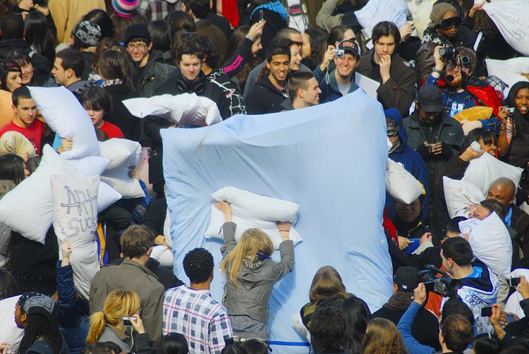 Union Square Pillow Fight | Someone thought it was a good idea to dress like a big pillow at the Pillow Fight, he soon became the target and went down quick.