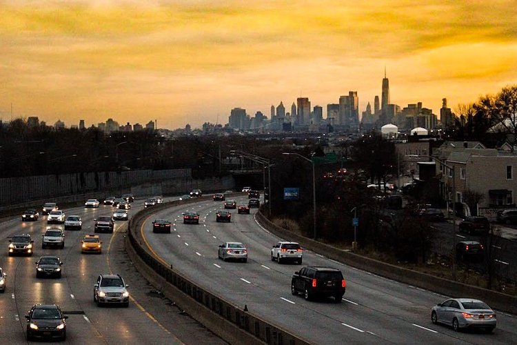 Overpass in Maspeth, Queens with Lower Manhattan skyline in the backround.