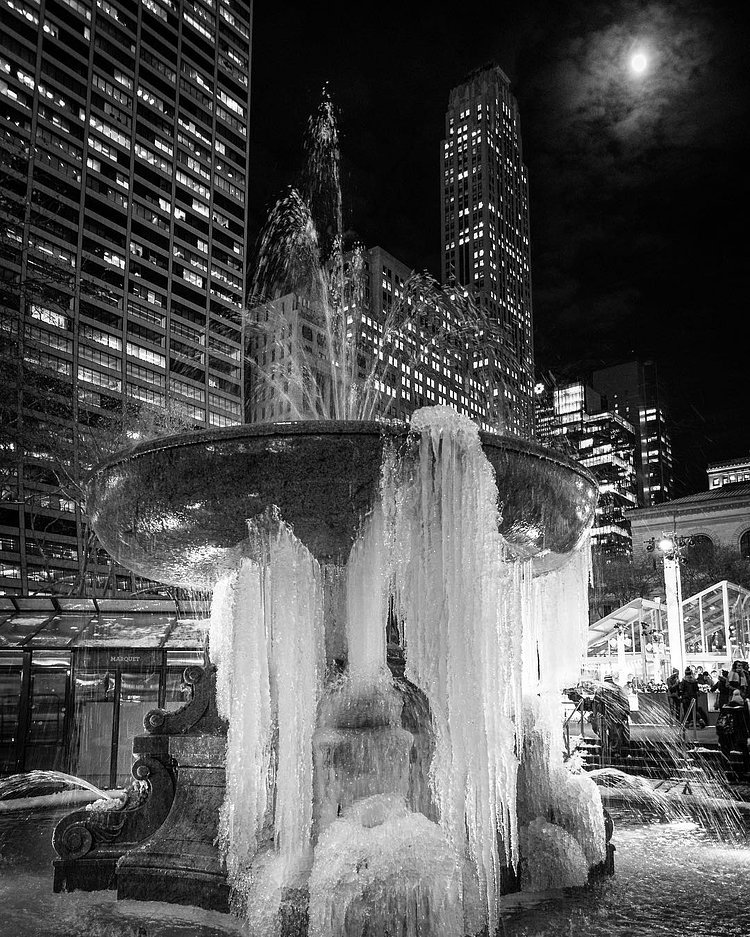 At work late, forgot how beautiful the park is at night ... #wintervillage #bryantpark #midtown #nyc #winterishere #walkabout #bpfrozenfountain
