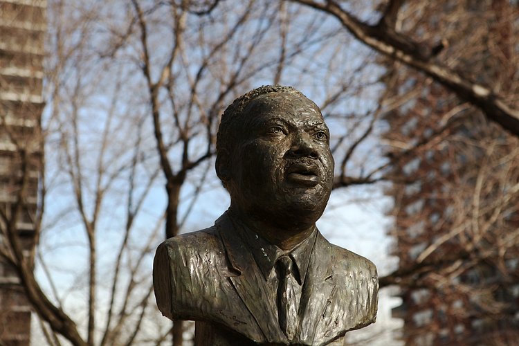 Martin Luther King, Jr. Statue in NYC - Harlem Tribute | <b>This bust/statue of Martin Luther King is up in Harlem and I went there today to take a picture of Dr. King on his day.

Taken on Martin Luther King Day 2012 in Harlem, New York.

Here is what the plaque on the front of the obelisk says:</b>

"I say to you today, my friends, that in spite of the difficulties and frustrations of the moment I still have a dream.  It is a dream rooted in the American dream."

"I have a dream that one day this nation will rise up and live out the true meaning of its creed: 'We hold these truths to be self-evident; that all men are created equal.'"

"I have a dream that one day on the red hills of Georgia the sons of former slaves and the sons of former slave owners will be able to sit down together at the table of brotherhood."

"When we let freedom ring, when we let it ring from every village and every hamlet, from every state and every city, we will be able to speed up the day when all of God's children, black men and white men, Jews and Gentiles, Protestants and Catholics, will be able to join hands and sing in the words of the old Negro spiritual: 'Free at last! Free at last!  Thank God Almighty, we are free at last!"

"I HAVE A DREAM TODAY"

REV. DR. MARTIN LUTHER KING, JR.
January 15, 1929 - April 4, 1968