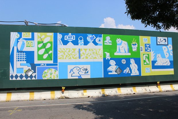 Comic strip-like scenes play out in Thomas Colligan's blue, yellow and green piece.