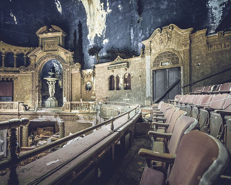 In the flickering light of the silver screen, the plaster detailing could easily be mistaken for solid gold.