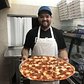 See how Paulie's Pizzeria makes its thin crust pizza