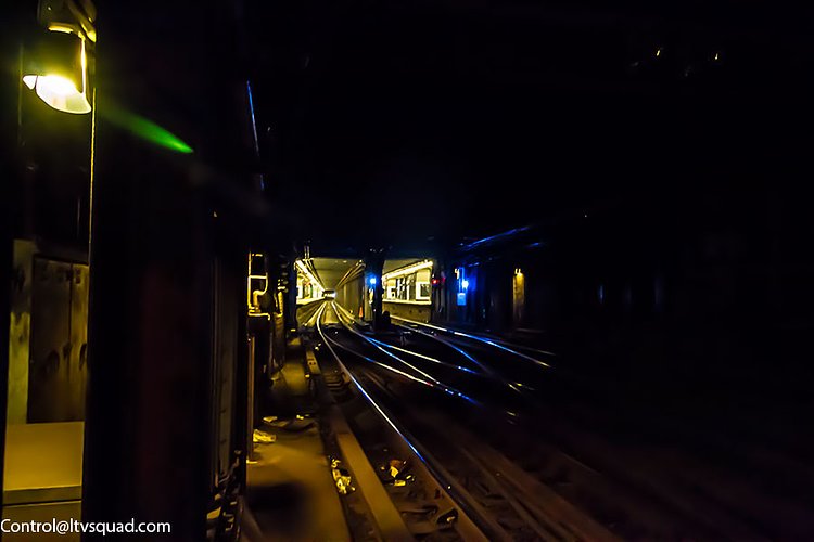 Coming north from 168th street, the two center tracks ramp upward, allowing the southbound A tracks to pass underneath. Due to the limited space within this yard, at least one train is often laid up on the yard lead tracks