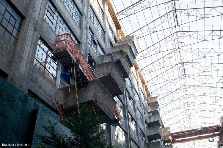 Here's another look at the balconies. Today, businesses use them to house air conditioners, air compressors, or other large equipment that is better in open air. A few put a table and chairs onto them for employees to lounge on.