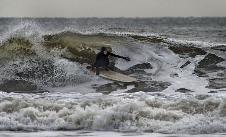 "Surfers are an anomaly in the city where most people are more interested in dousing themselves in martinis than salt water," Ashley Wood said. "For those of us who choose to live by the tides, though, surfing in NYC provides the ultimate combination of cultured life and catching waves."