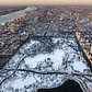 New York's Central Park is covered in snow in January.