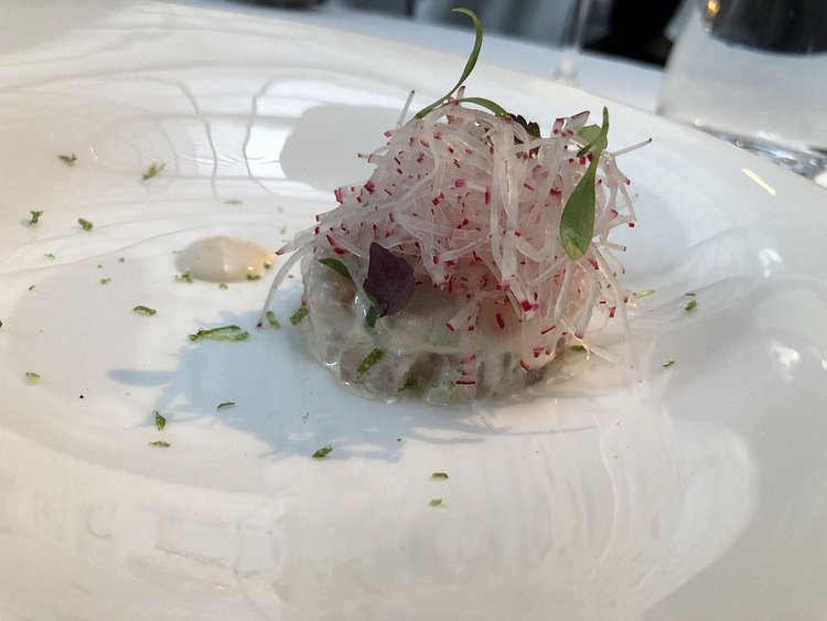 Hamachi tartare seasoned with smoked dashi and grated radish.
