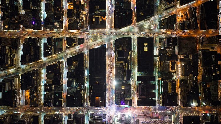 The lights on Broadway can be seen far above the city streets of midtown Manhattan.