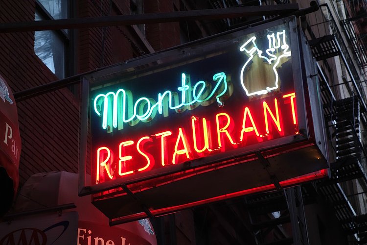Historic neon sign for Monte’s Restaurant on MacDougal Street