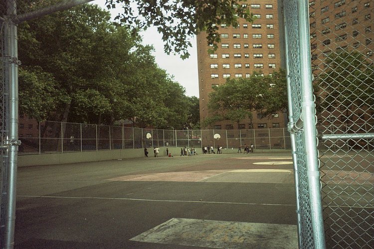 “Remember when the ball field was a dust bowl? Now paved, kids love to play basketball.”