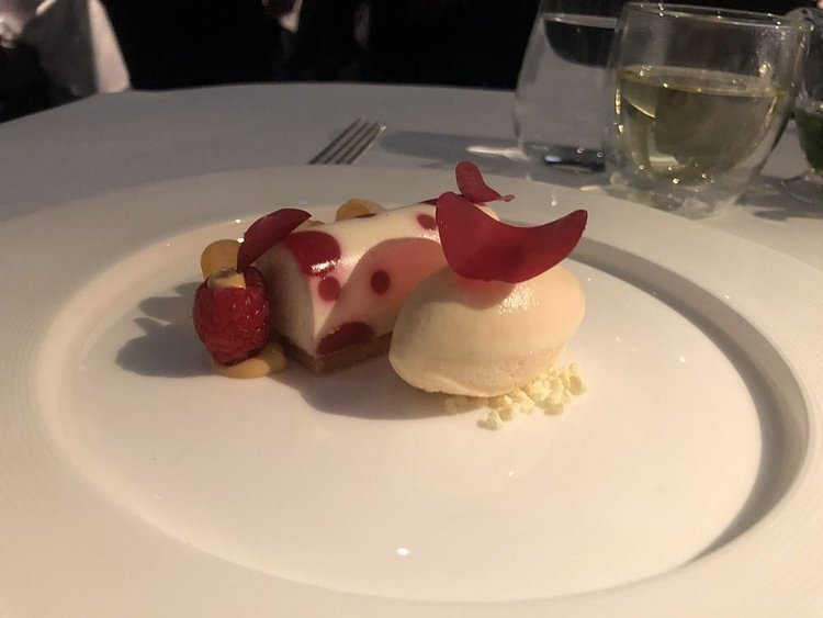 Chevre mousse with raspberry coulis and cantaloupe ice cream.