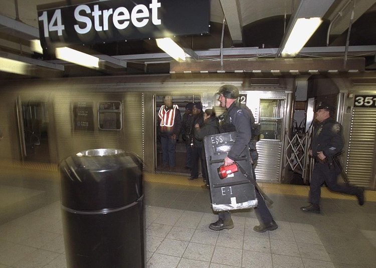 2000's: Police storm the station at 14th St. and 8th Avenue looking for a man that was shot in the leg by an off-duty NYPD officer after the suspect was seen holding a knife.