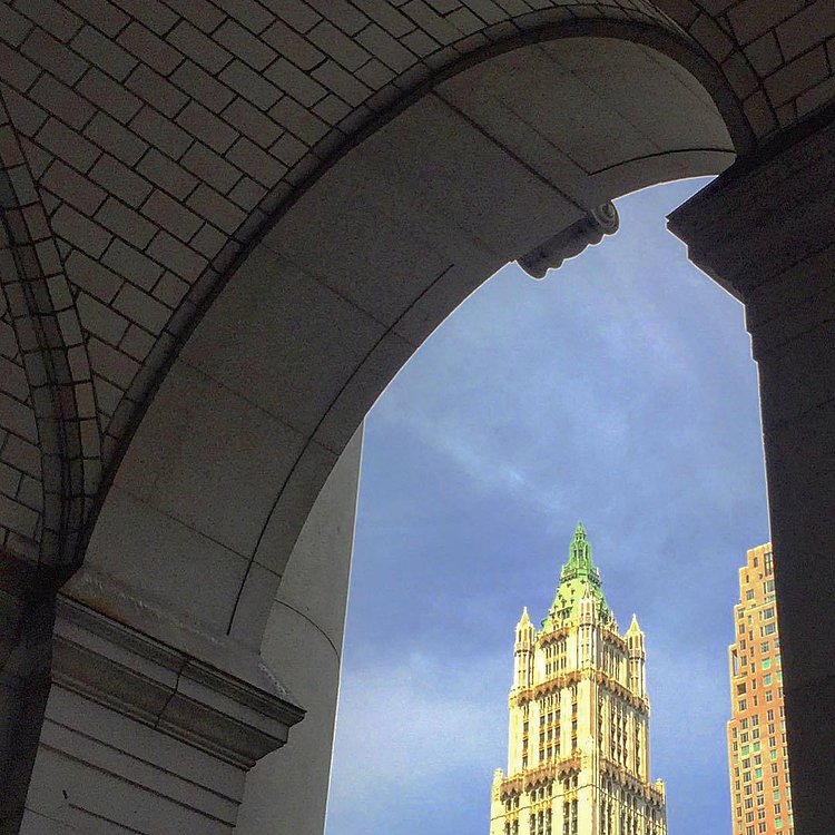 Peeking through the Municipal Building's Arch at the Woolworth Building.