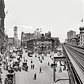 New York circa 1908. "Herald Square." Panorama composed of two 8x10 inch glass negatives, digitally merged, showing Broadway at 34th Street. Landmarks include the New York Herald newspaper building (with its clockwork blacksmith bell-ringers and electrified owls), Sixth Avenue elevated tracks, New York Times building and Hotel Astor. Detroit Publishing Co.