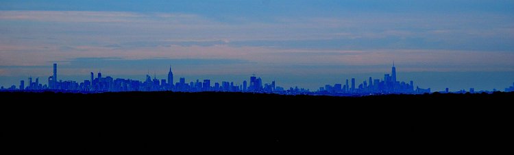 Mountain view of the city from 28.57 miles away