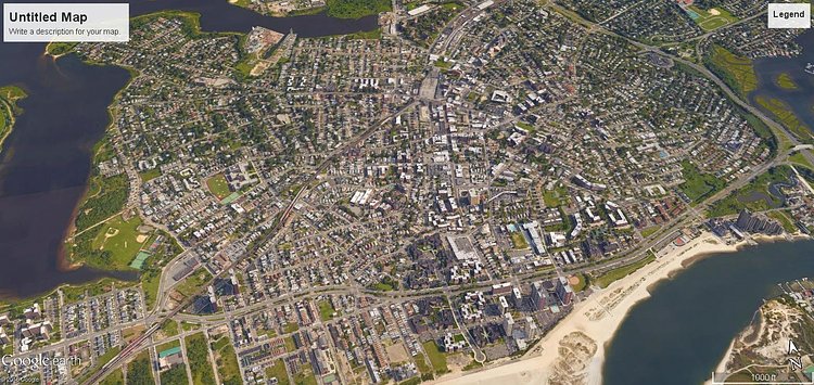 Far Rockaway, Queens. Tucked away in a corner far removed from the rest of the city, Far Rockaway has an infamous history of crime and drugs. I like its mix of big apartments and single family homes, its a very interesting place to look at from above. Hurricane Sandy hit this place especially hard.