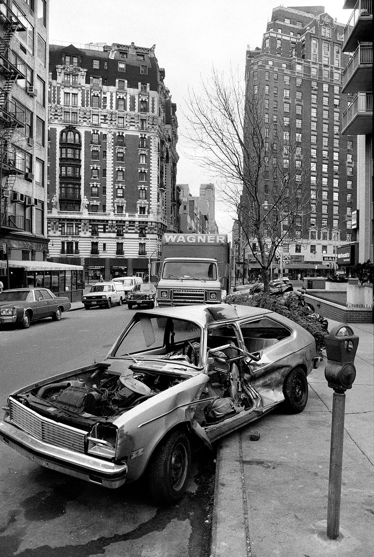 An abandoned car on West 71st Street near Amsterdam Avenue was not towed away for more than three weeks. Jan. 7, 1984.