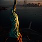 The Statue of Liberty hails dawn over New York Harbor in 1978.