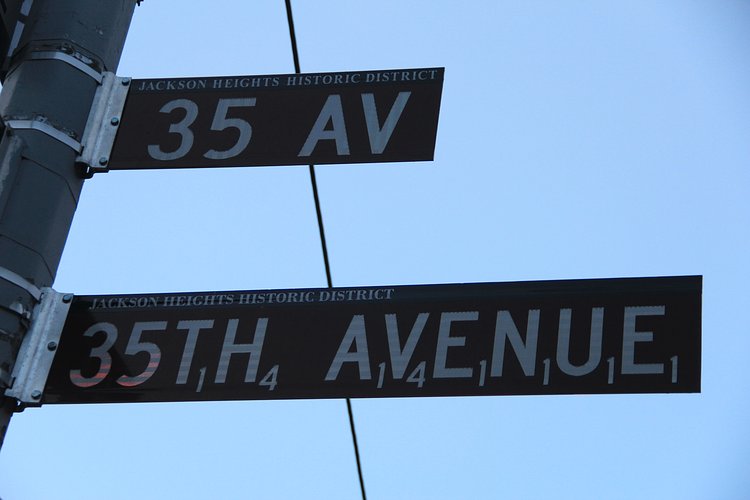 The street sign is a Jackson Heights icon