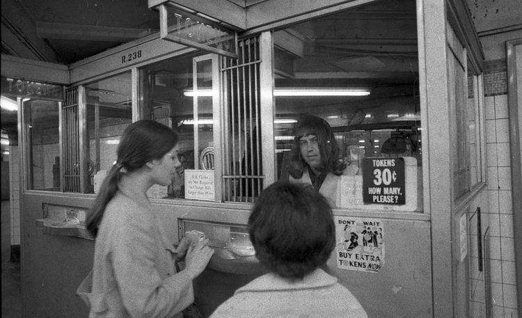 1970's: Undercover police officer Raymond Barse disguises himself as a female subway token clerk at the Grand Central station in order to halt the recent upsurge in subway armed robberies.