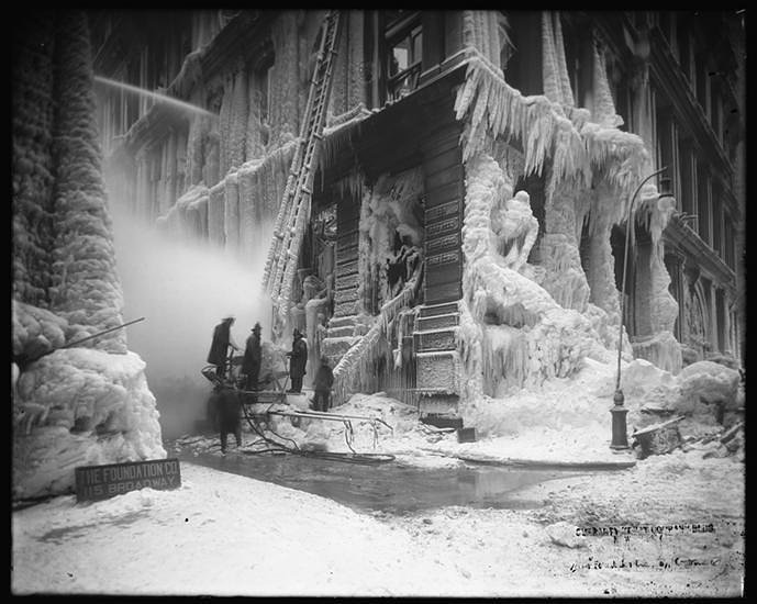 Cedar Street and Broadway. Fire at old Equitable Building Guaranty Trust Company Building, melting ice with steam. 1/12/1912