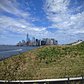A majestic view of Downtown Manhattan and One World Trade from The Hills on Governors island on Sept 11, 2016