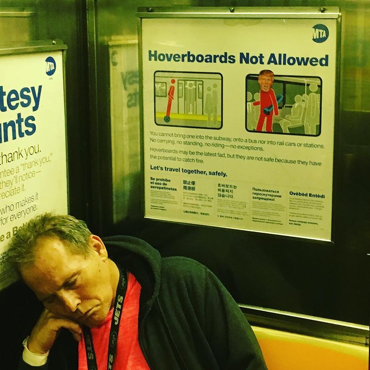 Snuck one up above a sleeping guy #nyc #subway #donaldtrump #makeamericagreatagain #streetart #subwaytrumpsticker #subwaytrumpstickers #trump #trumpsticker #trumpstickersubway