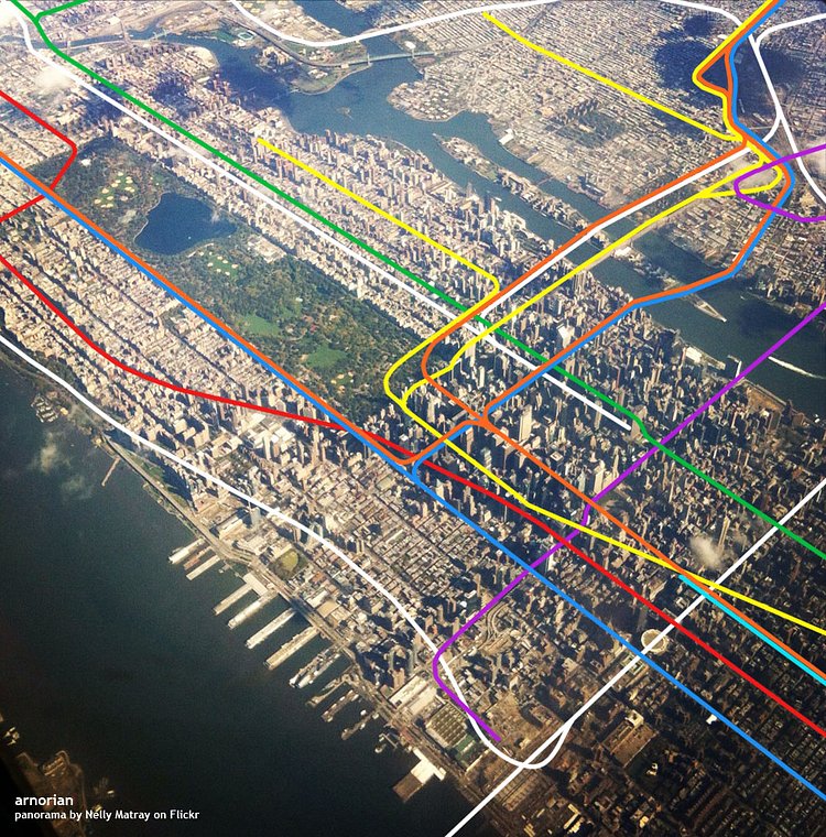 A skyview of Manhattan with overlayed subway and rail lines. 7 Subway Extension, the first phase of the Second Avenue Subway, and East Side Access included.