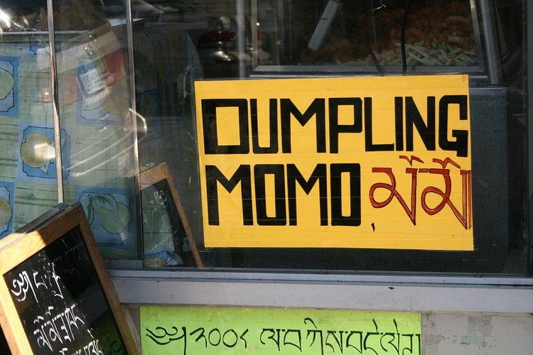 "Dumpling momo" sign at Merit Kabab Palace, Jackson Heights
