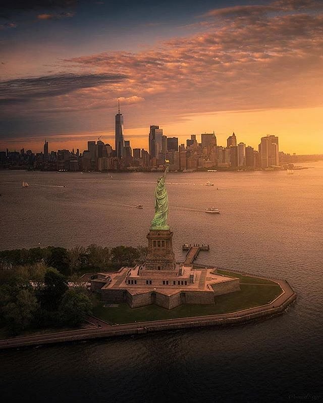 Statue of Liberty and New York Harbor at sunrise. Photo via @mindz.eye #viewingnyc