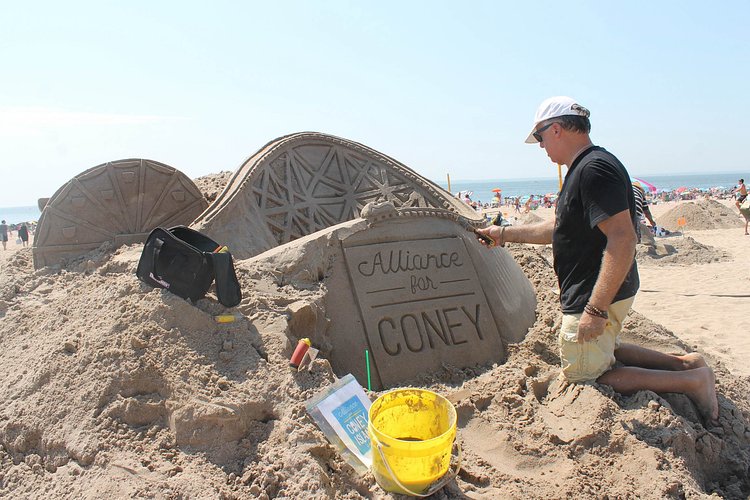 The Alliance for Coney Island, one of the contest’s supporters, was represented on the beach.
