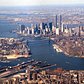 A 1981 view looking southwest: Wallabout Bay and East River (foreground), Hudson River (at right), Upper New York Bay (left) and Newark Bay in the distance.