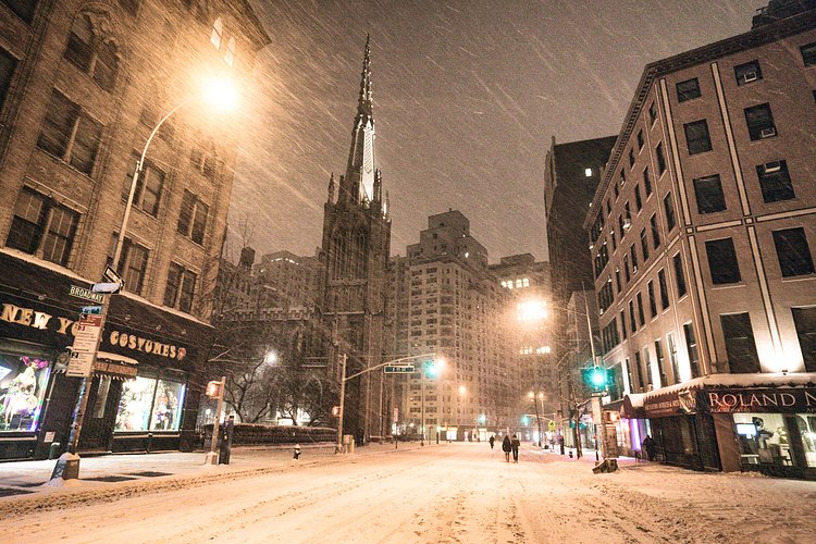 New York City - Snow - Winter Storm Juno - Empty Broadway | Juno: The first snowstorm of 2015 in New York City.

---

(Note: My <a href="http://www.amazon.com/gp/product/1440339589/ref=as_li_tl?ie=UTF8&amp;camp=1789&amp;creative=9325&amp;creativeASIN=1440339589&amp;linkCode=as2&amp;tag=nyththle0e-20&amp;linkId=ER6GYT5FRYNMEPLF" rel="nofollow">New York photography book</a> released worldwide in stores/online recently and has photos similar to this  [full info below])

---

I have been photographing New York City during snowstorms at night for the past 5 years. When it comes to experiencing <a href="http://nythroughthelens.com/tagged/snow" rel="nofollow">New York City in the snow</a>, I relish the challenge. The more gusty, snowy, and brutal the storm, the more of a chance that I will be out in it traipsing around New York City with my cameras in tow.

When I heard that the MTA was suspending all transit service (and most vehicles) at 11 pm, I made the decision to take the train up to the Upper East Side prior to 11 pm to deposit myself up there with the intention of walking from the Upper East Side to Times Square and then walking the several miles back to the Lower East Side (whew!!).

The streets were eerily empty.

Emptier than they are usually at night during snowfall. Since there was a ban on all vehicles aside from snow plows and emergency services, there were practically no cars at all on the streets. Even taxis were banned from the streets!

I walked in the middle of avenues and streets that are usually teeming with cars.

There was an eerie sense of calm.

It was magical.


---

This is part of a post that I posted to my NYC photography blog. If you are curious enough to look at the photos there, here is the link to the post:

<a href="http://nythroughthelens.com/post/109291619025/new-york-city-snow-winter-storm-juno-i" rel="nofollow">New York City - Winter Storm Juno</a>


----

* As mentioned above - My New York City coffee table book that released in stores/online worldwide recently.

 Tons of information about my <a href="http://www.amazon.com/gp/product/1440339589/ref=as_li_tl?ie=UTF8&amp;camp=1789&amp;creative=9325&amp;creativeASIN=1440339589&amp;linkCode=as2&amp;tag=nyththle0e-20&amp;linkId=ER6GYT5FRYNMEPLF" rel="nofollow">New York photography book</a> with sample pages (including where to order and what stores are carrying it) here:

<a href="http://nythroughthelens.com/post/92873566010/ny-through-the-lens-the-book-i-am-super" rel="nofollow">NY Through The Lens: A New York Coffee Table Book</a>
---


View my New York City photography at my website <a href="http://nythroughthelens.com/" rel="nofollow">NY Through The Lens</a>.

View my Travel photography at my travel blog: <a href="http://travelinglens.me/" rel="nofollow">Traveling Lens</a>.

Interested in my work and have questions about PR and media? Check out my:

<a href="http://nythroughthelens.com/about" rel="nofollow">About Page</a> | <a href="http://nythroughthelens.com/PR" rel="nofollow">PR Page</a> | <a href="http://nythroughthelens.com/media" rel="nofollow">Media Page</a>