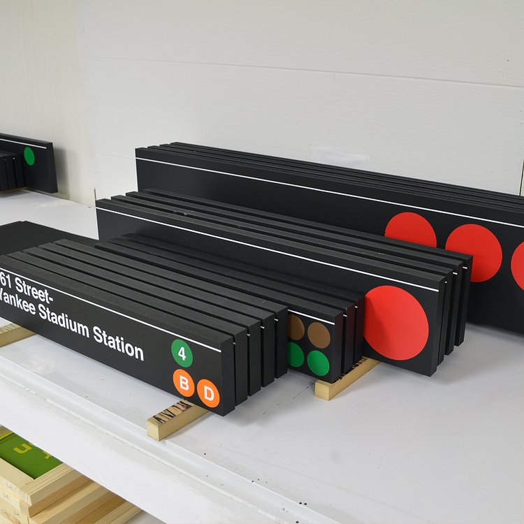 Signs in progress. Sideway Signs - High-quality New York City subway signs officially licensed by the MTA.