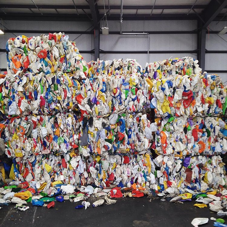 #HDPE #plastic #bales ready to be shipped to factories to be turned into new bottles, pipes, bags, etc. Bales like these each weigh around 1,200 lbs!