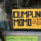 "Dumpling momo" sign at Merit Kabab Palace, Jackson Heights