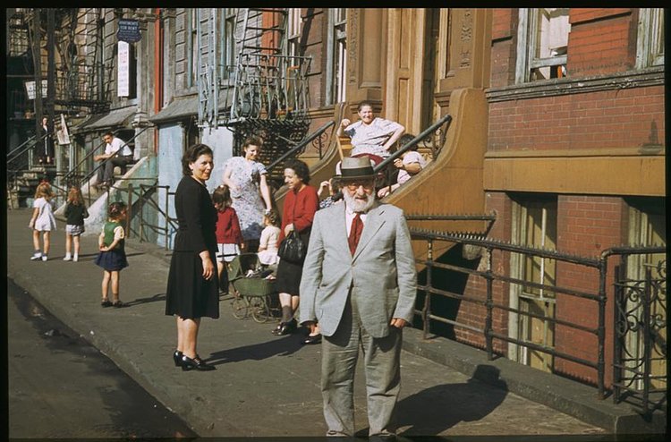 Residents socialize on Clinton Street on Manhattan's Lower East Side on a Saturday afternoon.