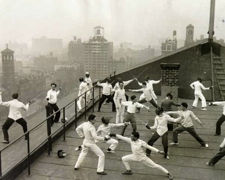 Fencing practice on the roof of one of the University buildings, January 1929