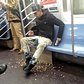 Asshole throwing nuts onto NYC Subway Floor