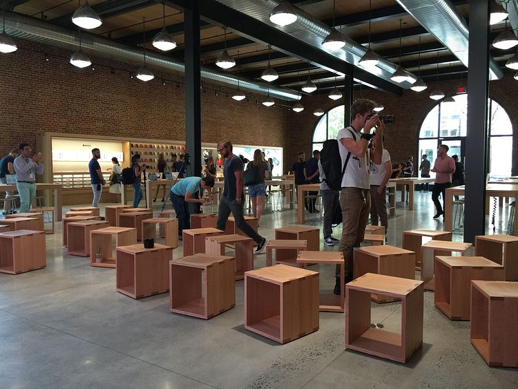 Apple says the wooden cubes are for customers and community members to gather.