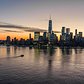 Sunset over New York Harbor and Lower Manhattan Skyline
